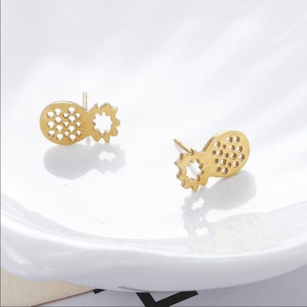 Gold tone pineapple earrings